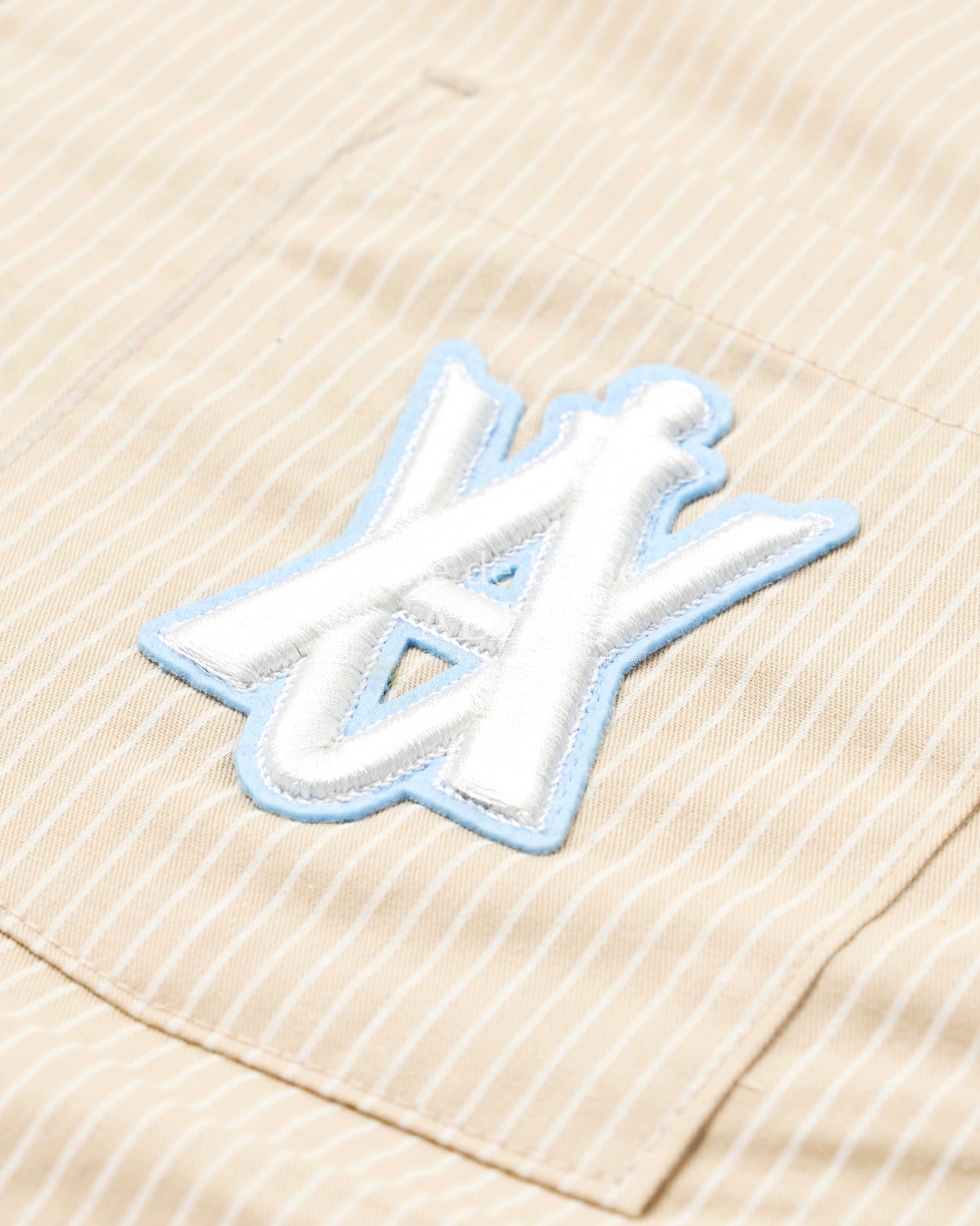 ADLV x LISA A LOGO EMBLEM PATCH STRIPE SHORT SLEEVE SHIRT (BEIGE)