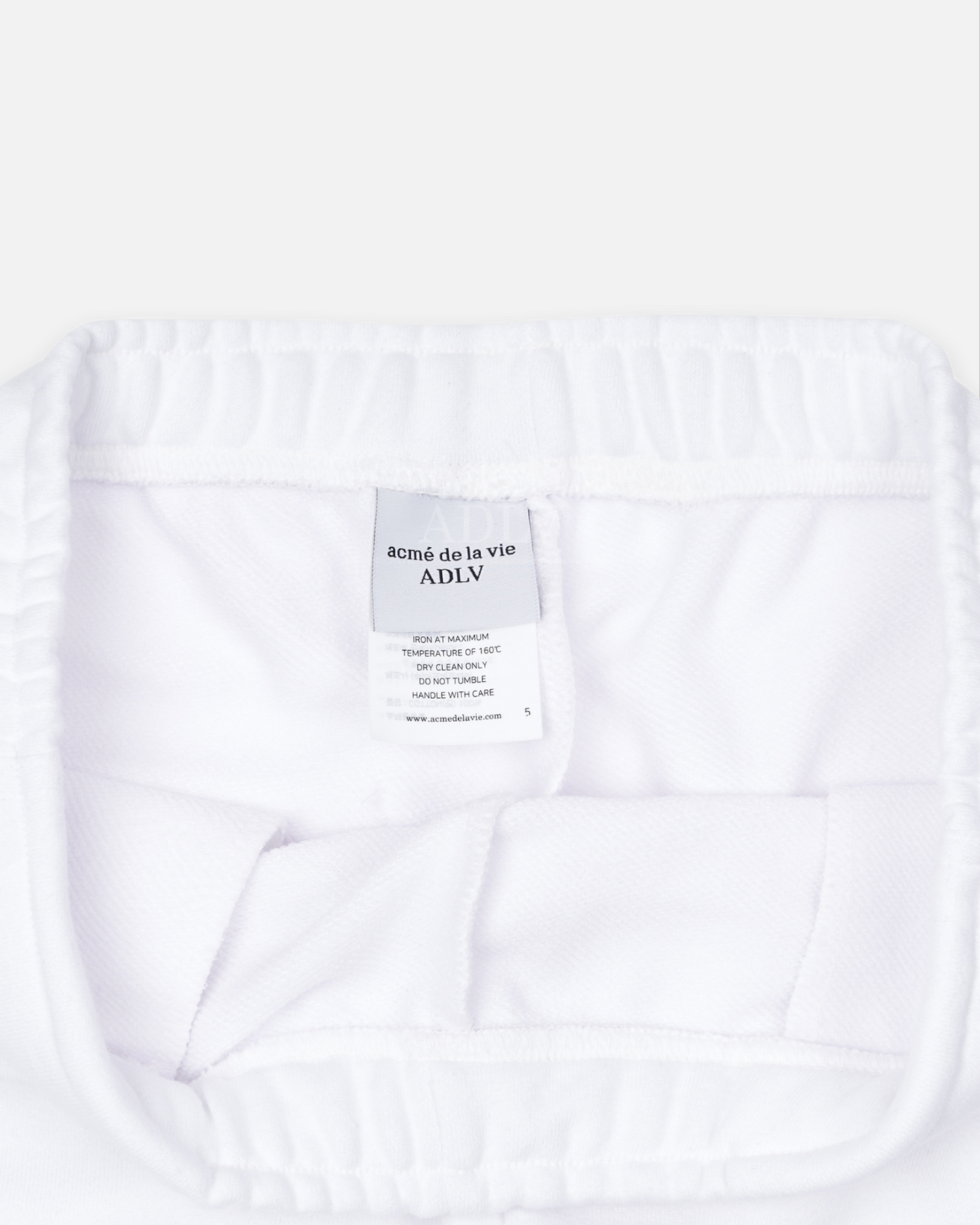 ADLV x LISA A LOGO EMBLEM PATCH TRAINING PANTS (WHITE)