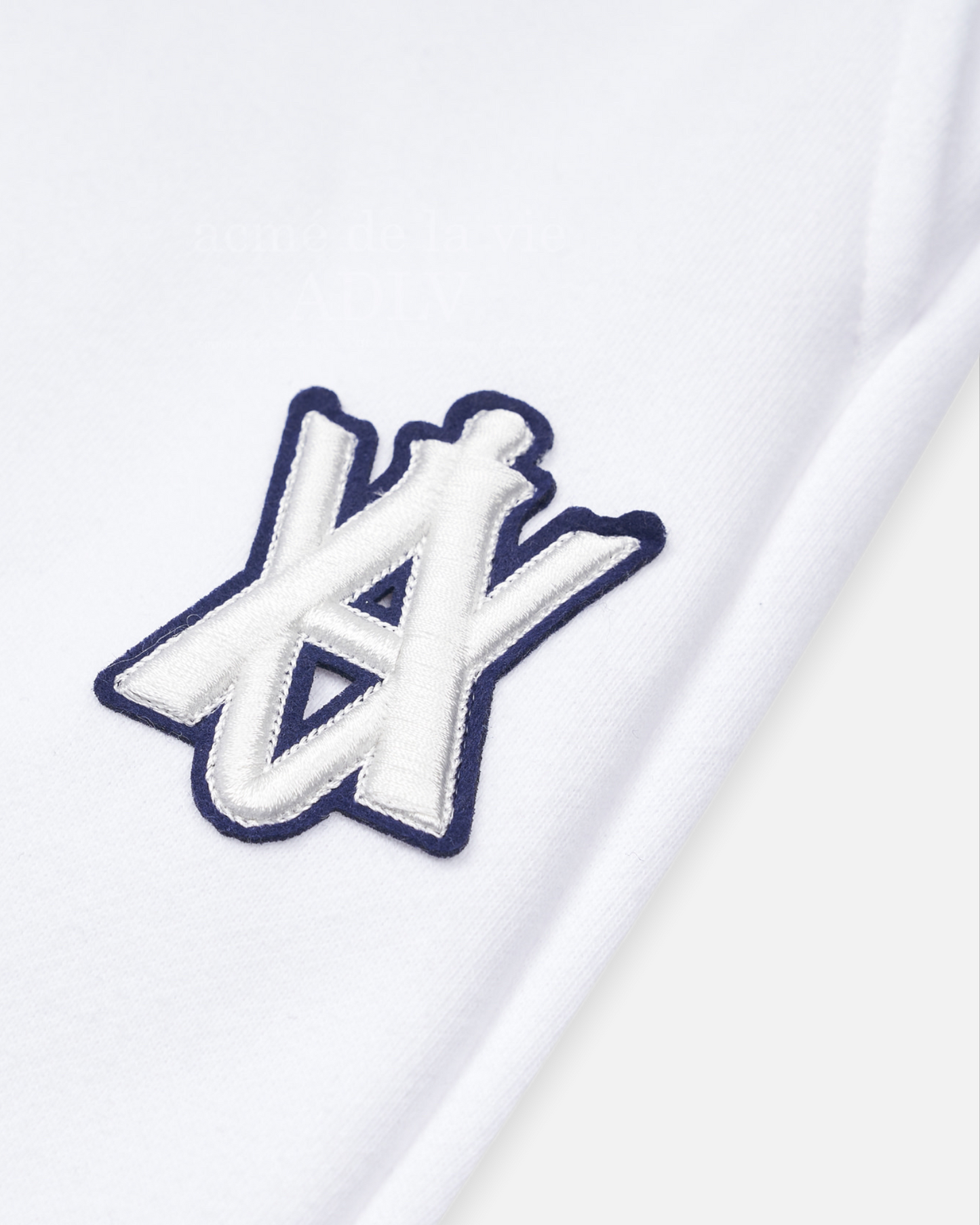 ADLV x LISA A LOGO EMBLEM PATCH TRAINING PANTS (WHITE)
